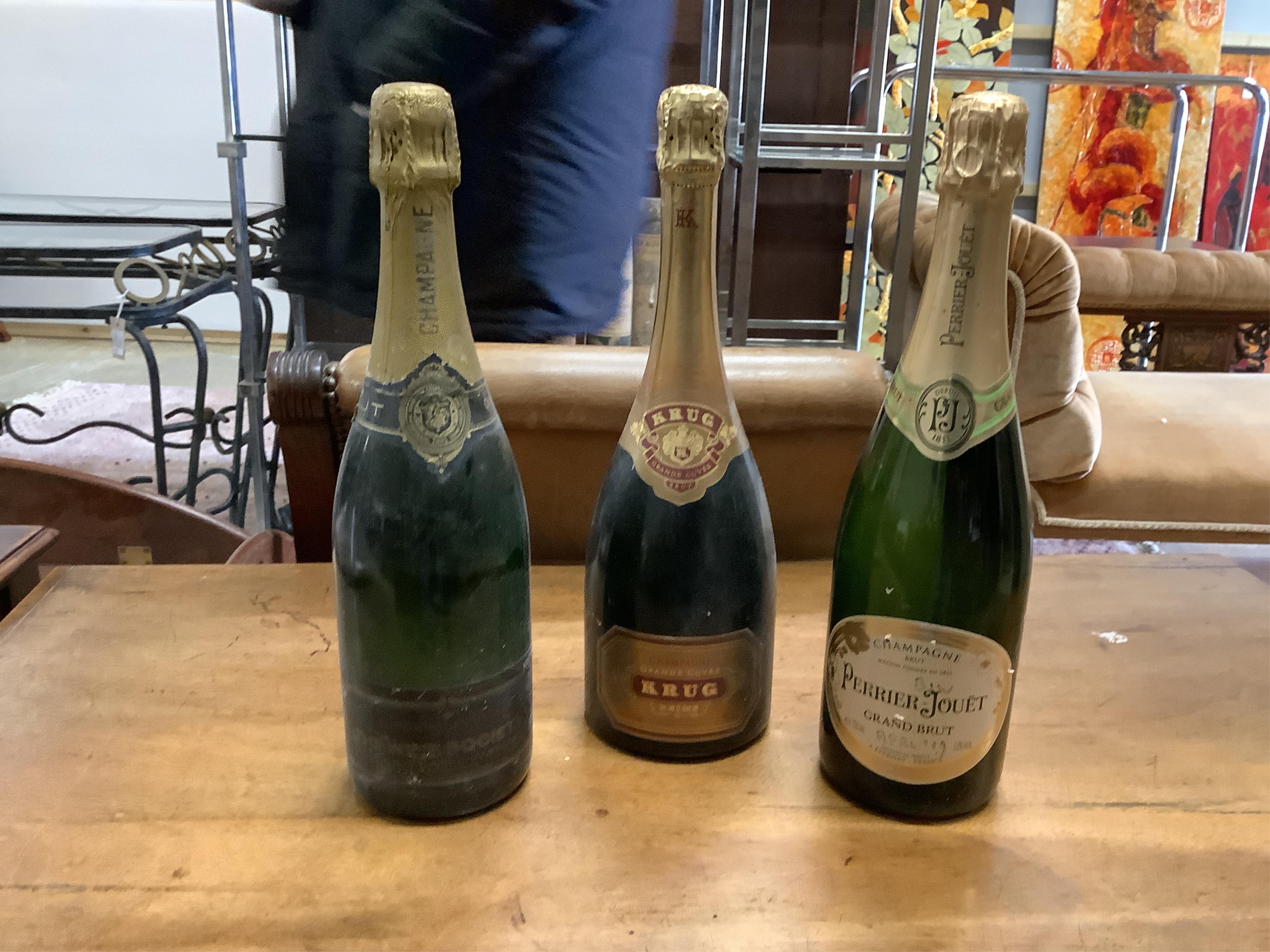 Ten bottles of assorted champagne to include Krug, Taittinger, Laurent-Perrier and Moët. (From a local private cellar). Condition - some labels degraded